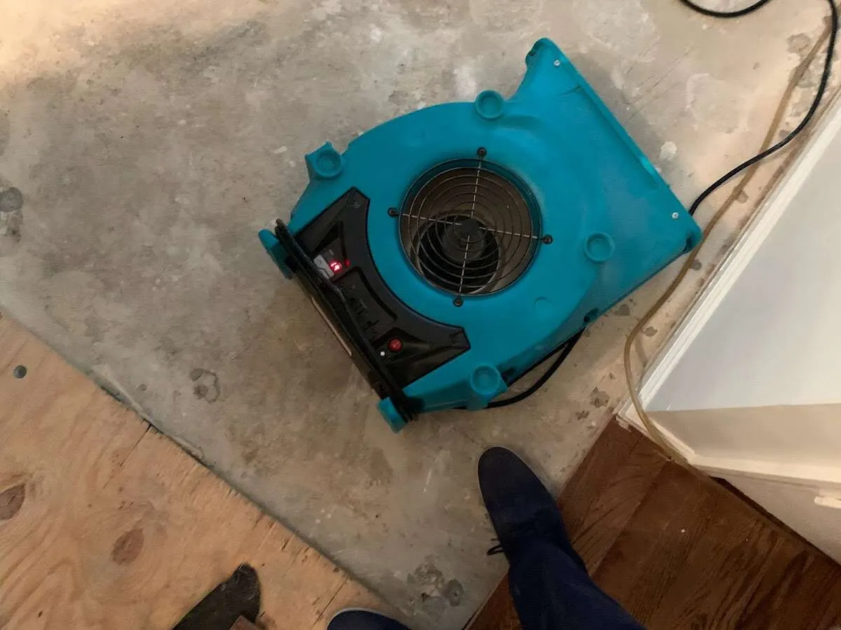 Air mover drying subfloor during Leak Detection & Repair in Fort Myers Beach