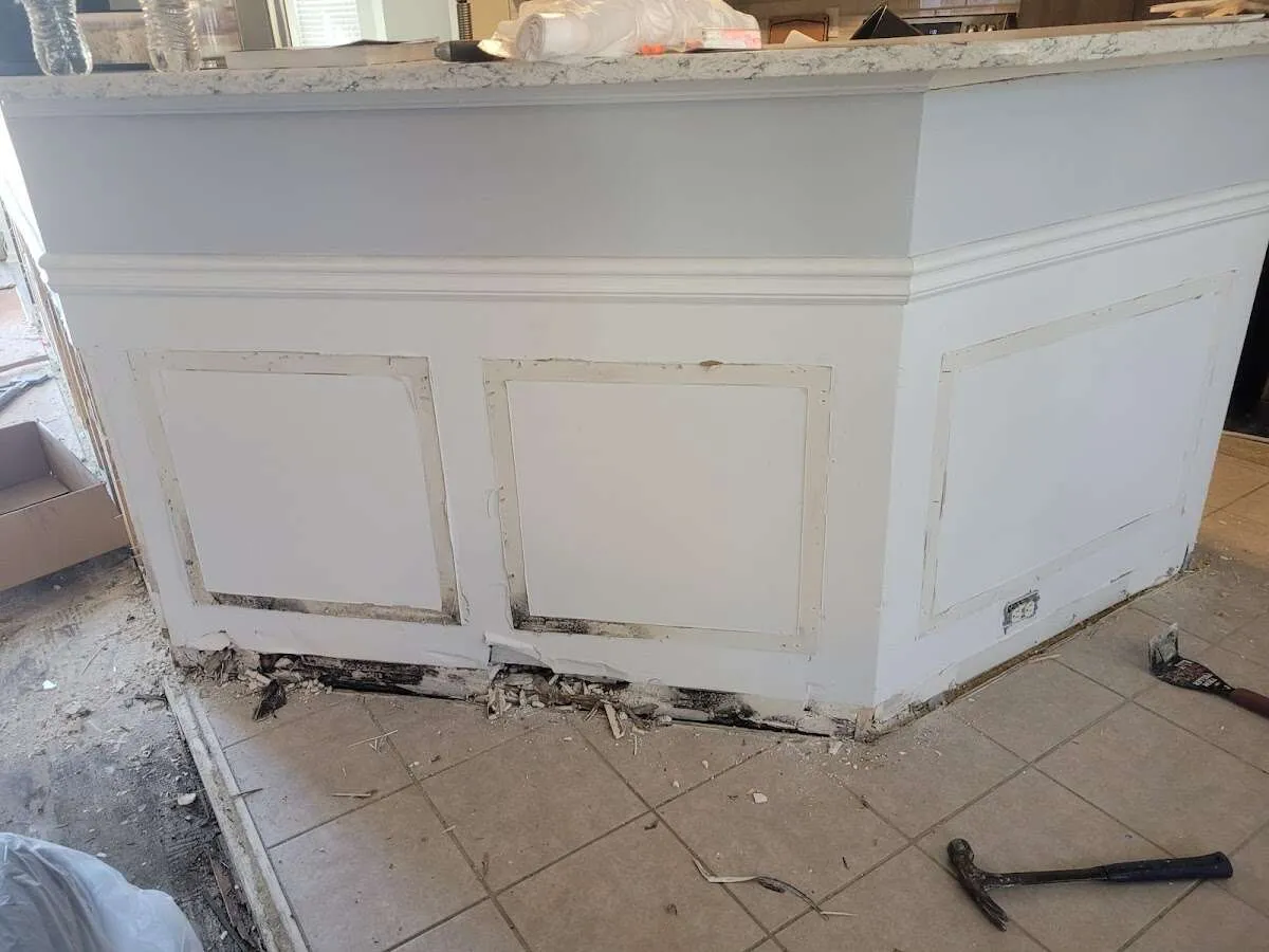 Water damage and mold on kitchen during Sewage Cleanup & Sanitation in Fort Myers Beach
